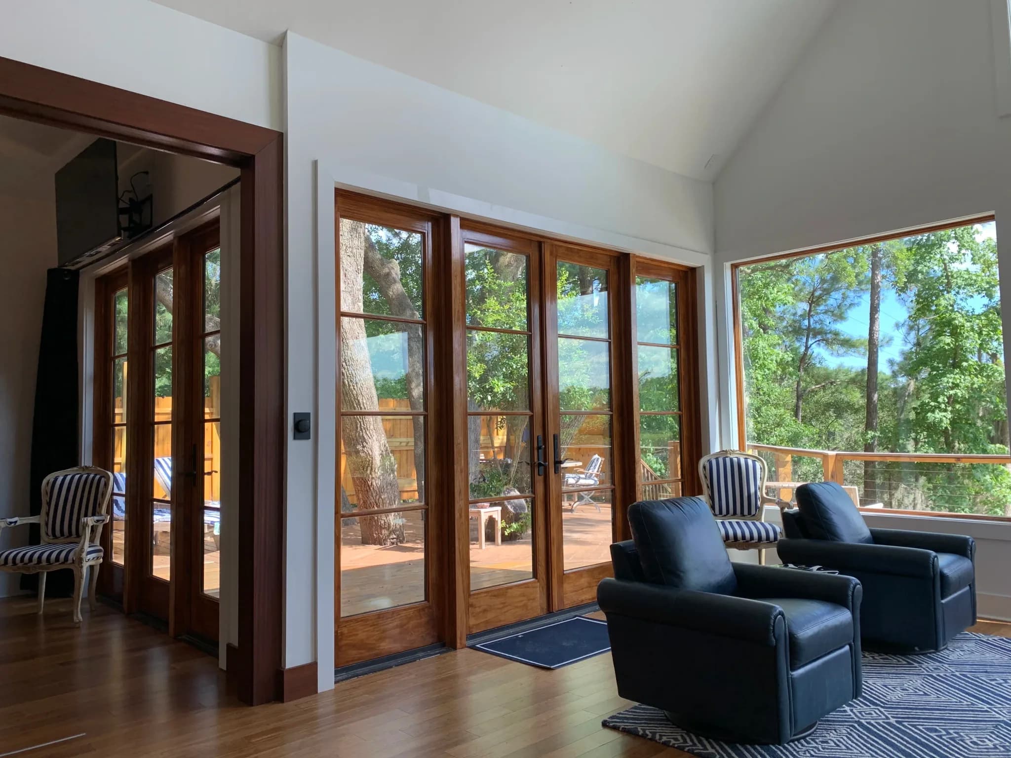 Looking out from the kitchen at Charleston Treehouse onto the deck and canopy